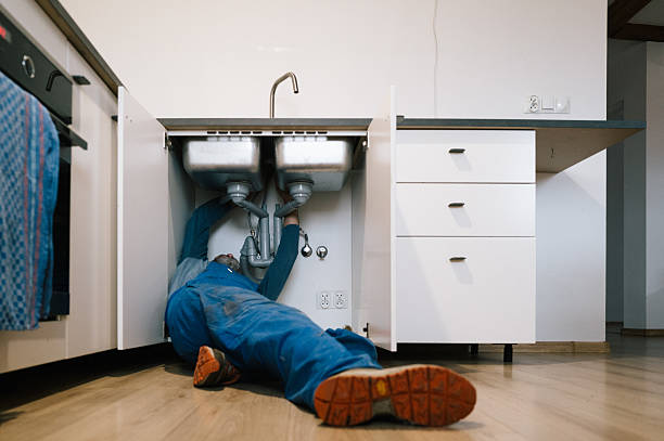 Professional Drain Cleaning technician working in Benton, MS